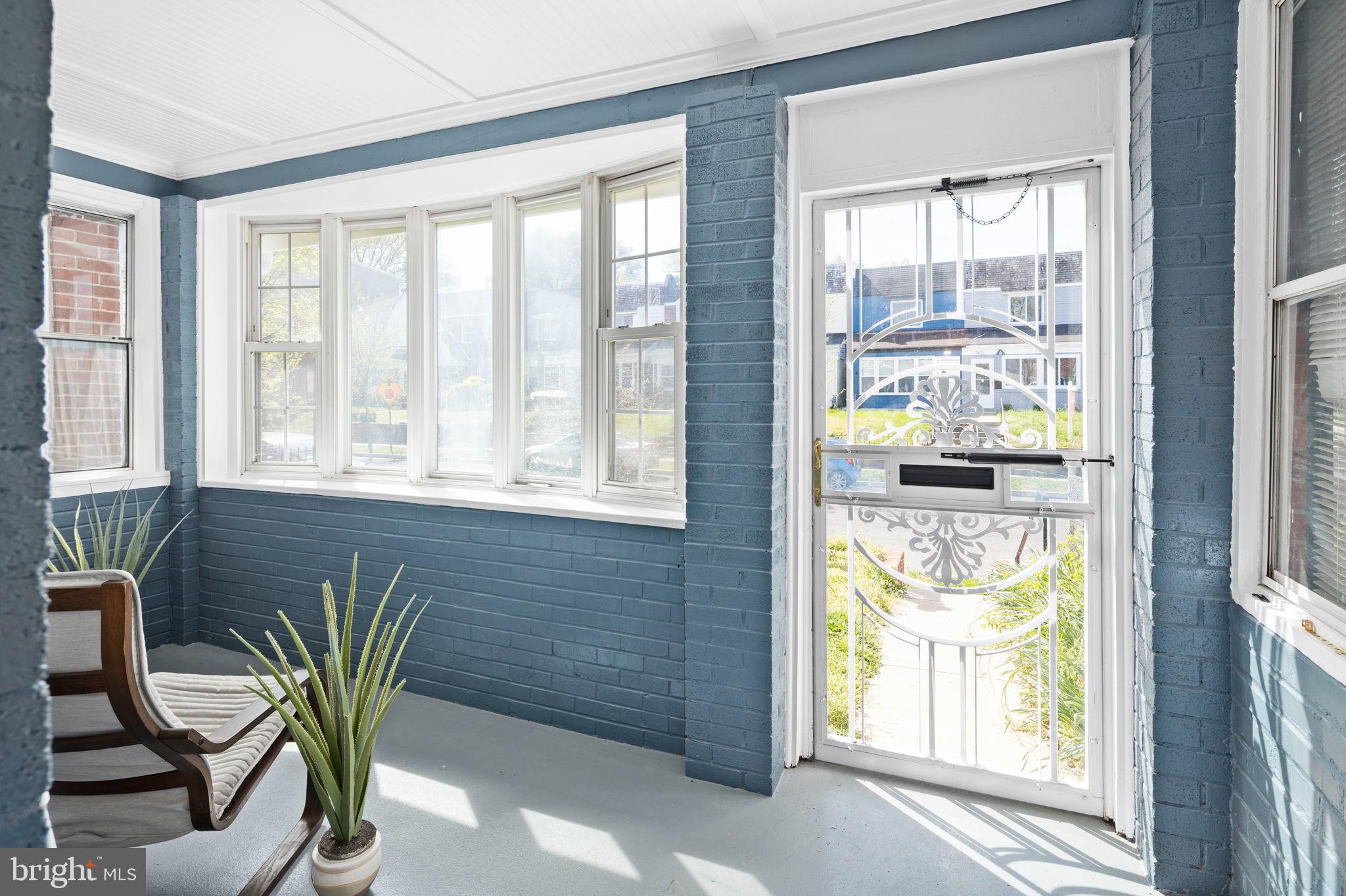 3418 Baker Street Northeast Washington, DC 20019 - Photo 43 of 46 a view of a livingroom with furniture and a window