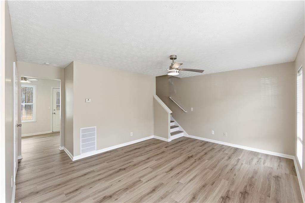 3789 Waldrop Lane Decatur, GA 30034 - Photo 4 of 22 a view of empty room with wooden floor