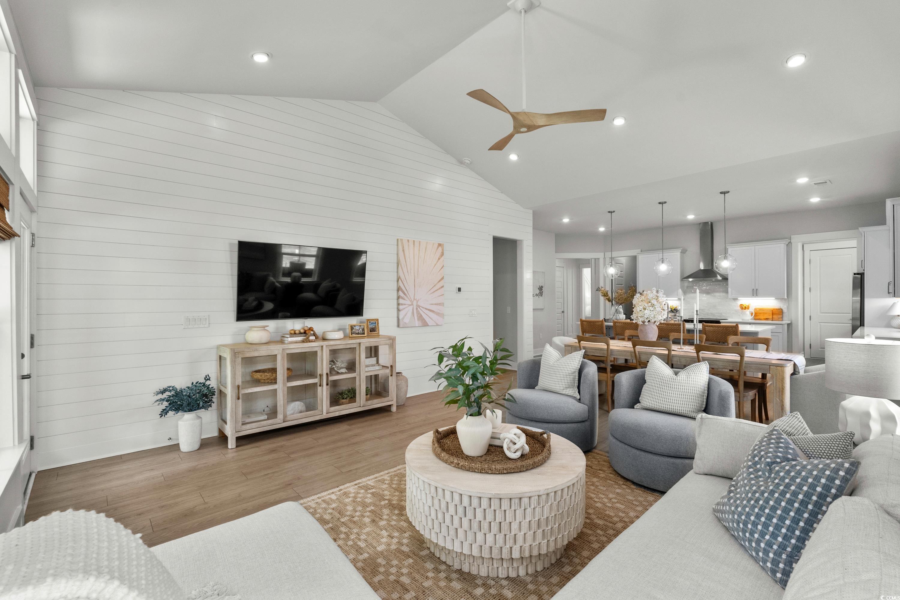 906 Foxtail Drive, Unit D44 Longs, SC 29568 - Photo 12 of 34 Kitchen featuring white cabinetry, light wood-style flooring, stainless steel fridge with ice dispenser, tasteful backsplash, and recessed lighting
