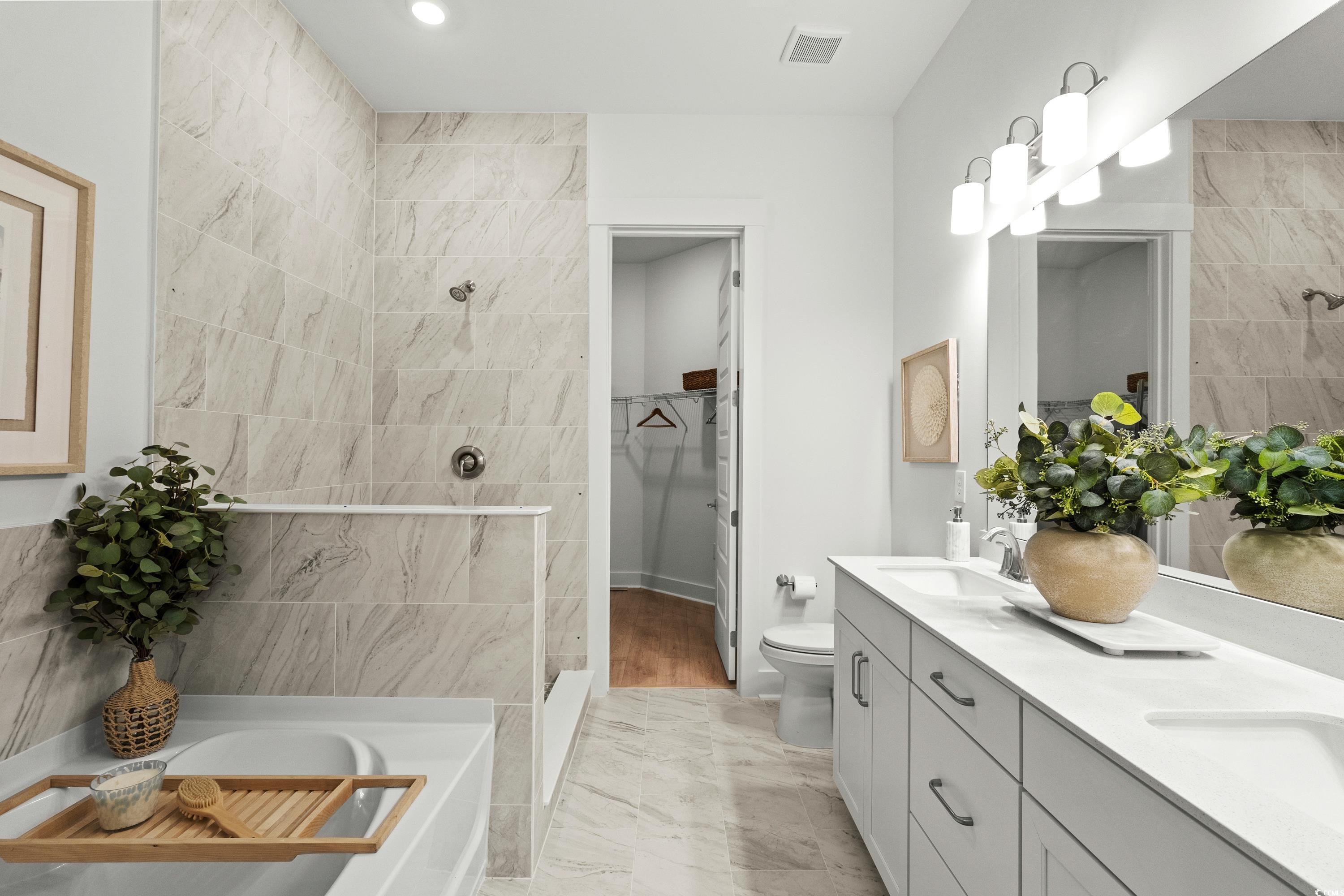 906 Foxtail Drive, Unit D44 Longs, SC 29568 - Photo 15 of 34 Bedroom featuring ceiling fan, light wood-style floors, a decorative wall, and recessed lighting