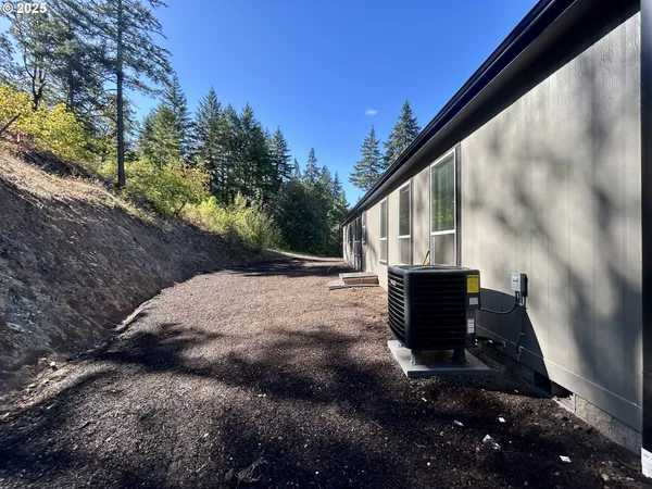 a view of backyard with seating space
