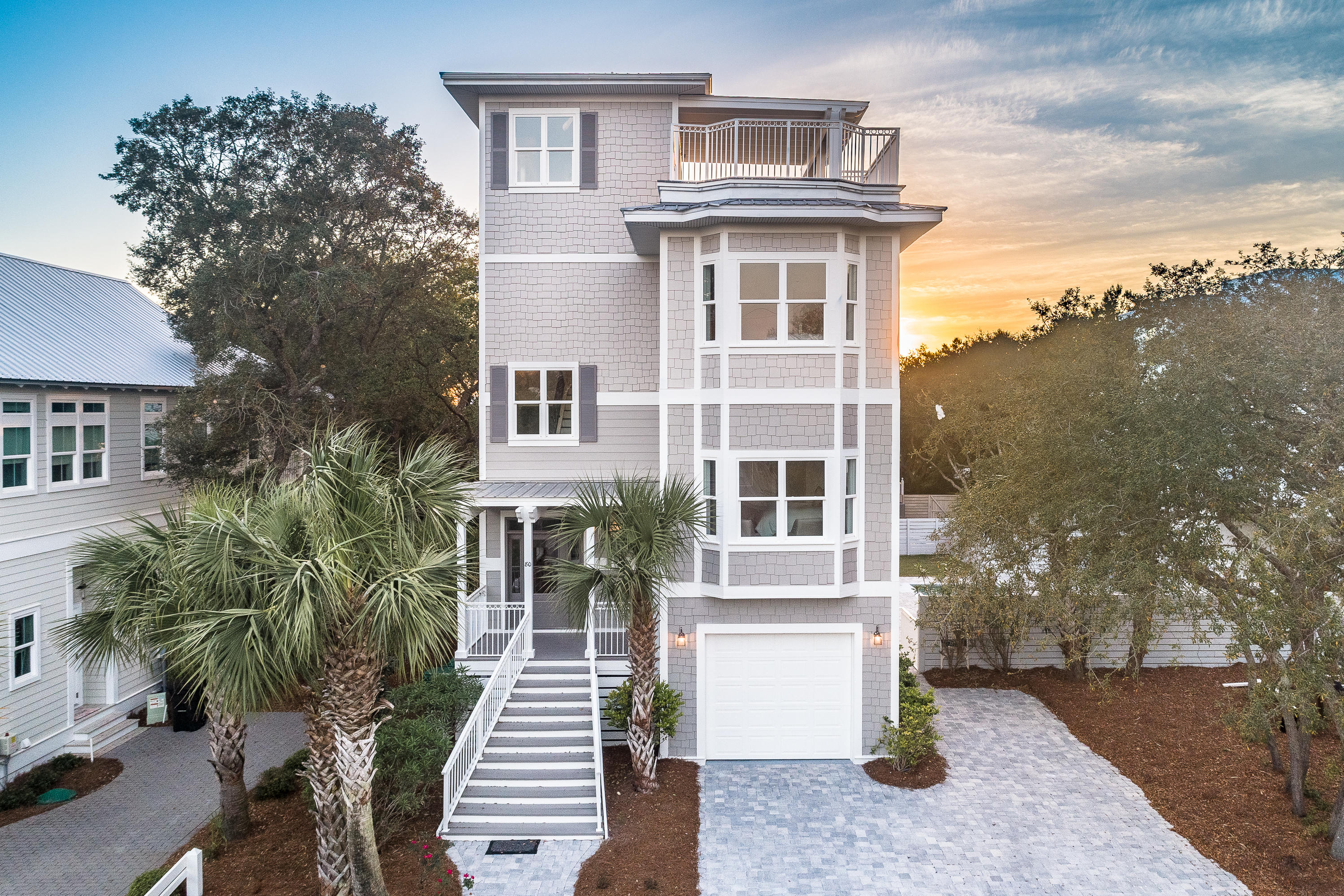 80 Blue Lake Road Santa Rosa Beach, FL 32459 - Photo 54 of 57 a front view of a house with a yard