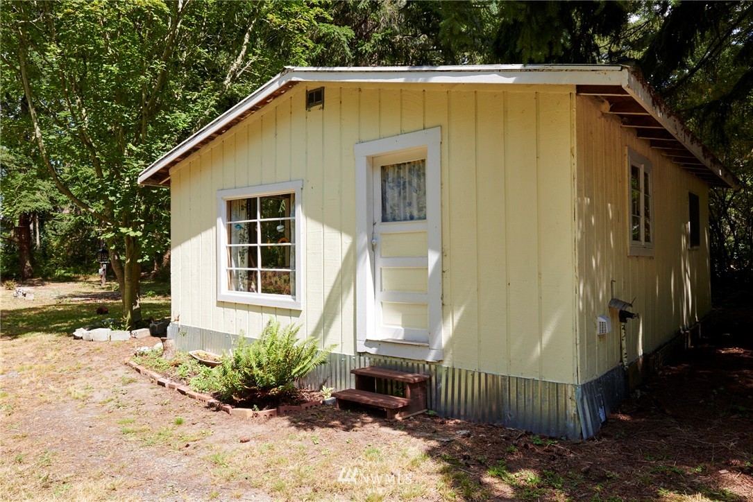 1505 East Roy Road Freeland, WA 98249 - Photo 11 of 13 a view of a house with a yard