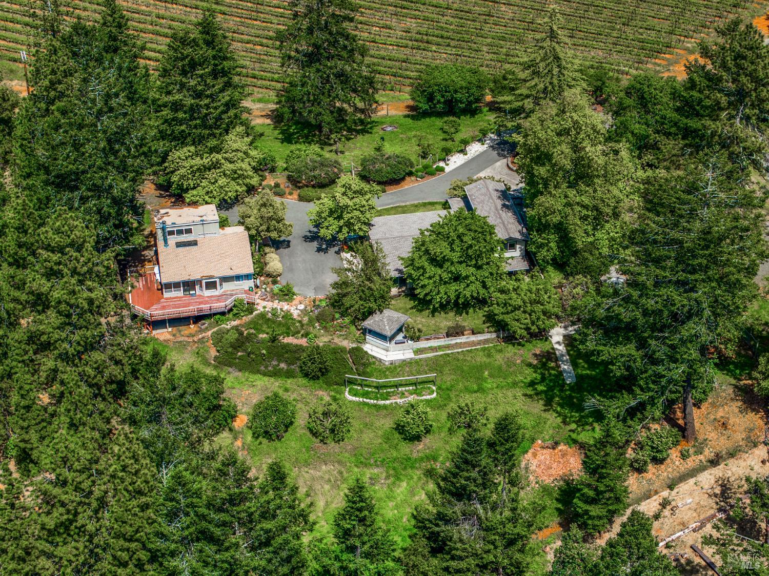 625-629 Hill Road Angwin, CA 94508 - Photo 36 of 64 an aerial view of a house with a yard