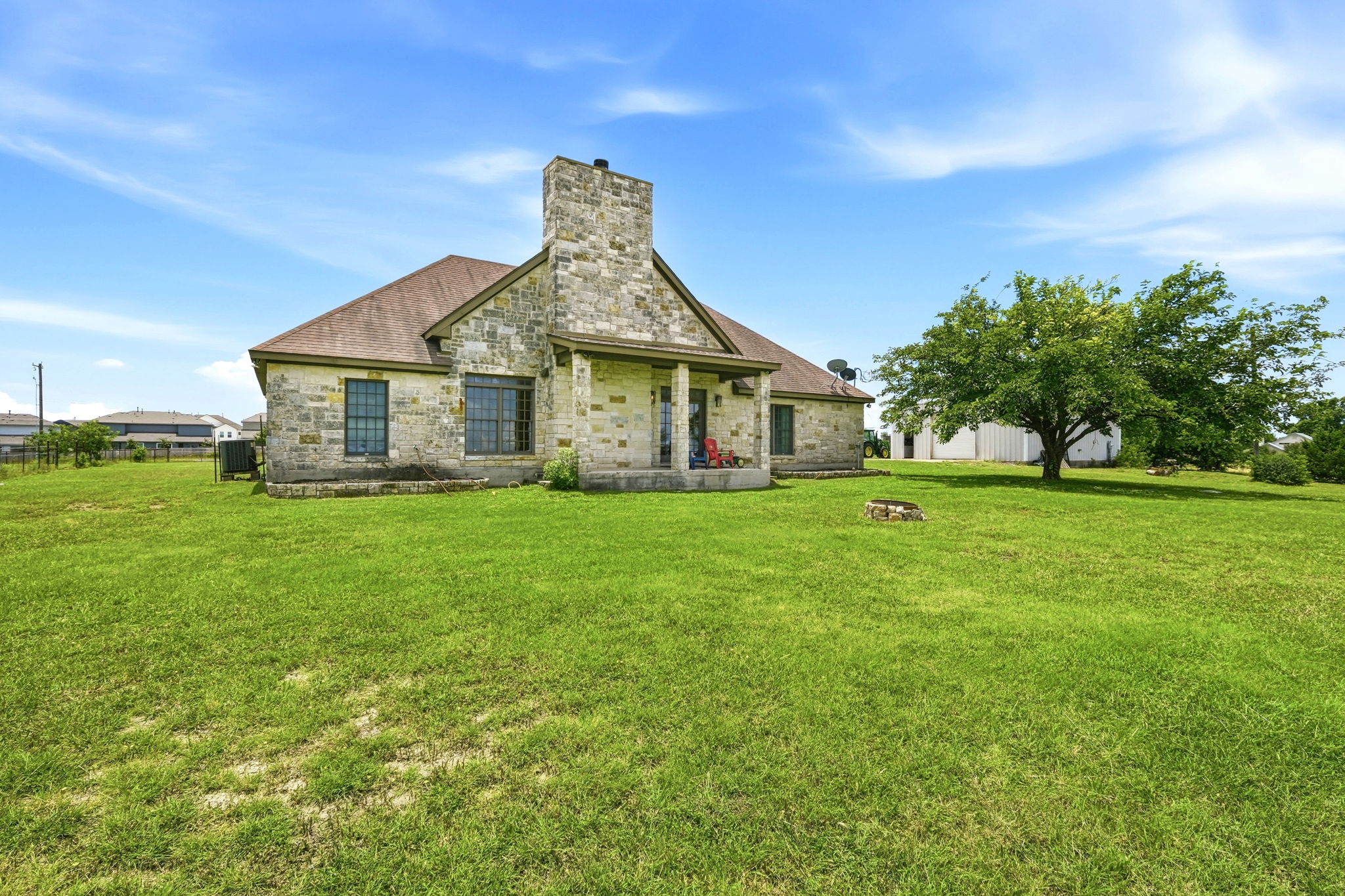 701 County Road 107 Georgetown, TX 78626 - Photo 29 of 30 a front view of a house with garden
