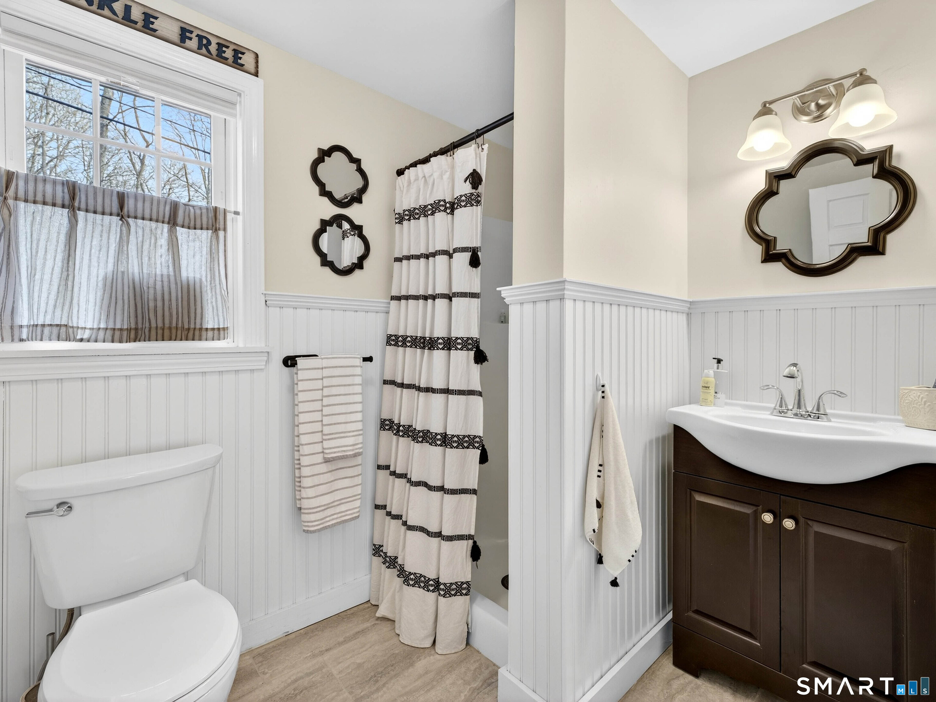 41 Old W Road East Haddam, CT 06423 - Photo 37 of 39 a bathroom with a toilet sink and mirror