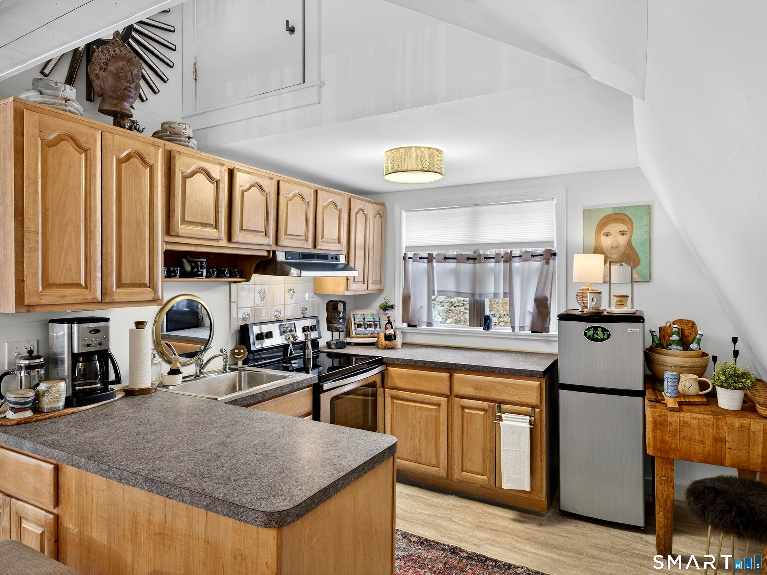 41 Old W Road East Haddam, CT 06423 - Photo 38 of 39 a kitchen with granite countertop a sink a counter space appliances and cabinets