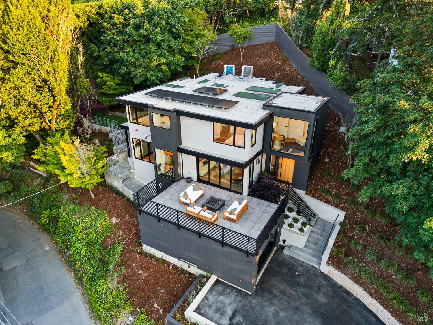 975 Greenhill Road Mill Valley, CA 94941 - Photo 12 of 53 an aerial view of a house with balcony and outdoor seating