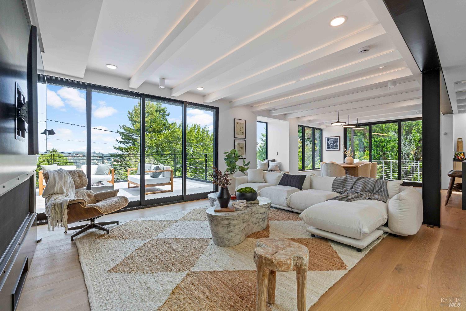 975 Greenhill Road Mill Valley, CA 94941 - Photo 15 of 53 a living room with furniture and a large window