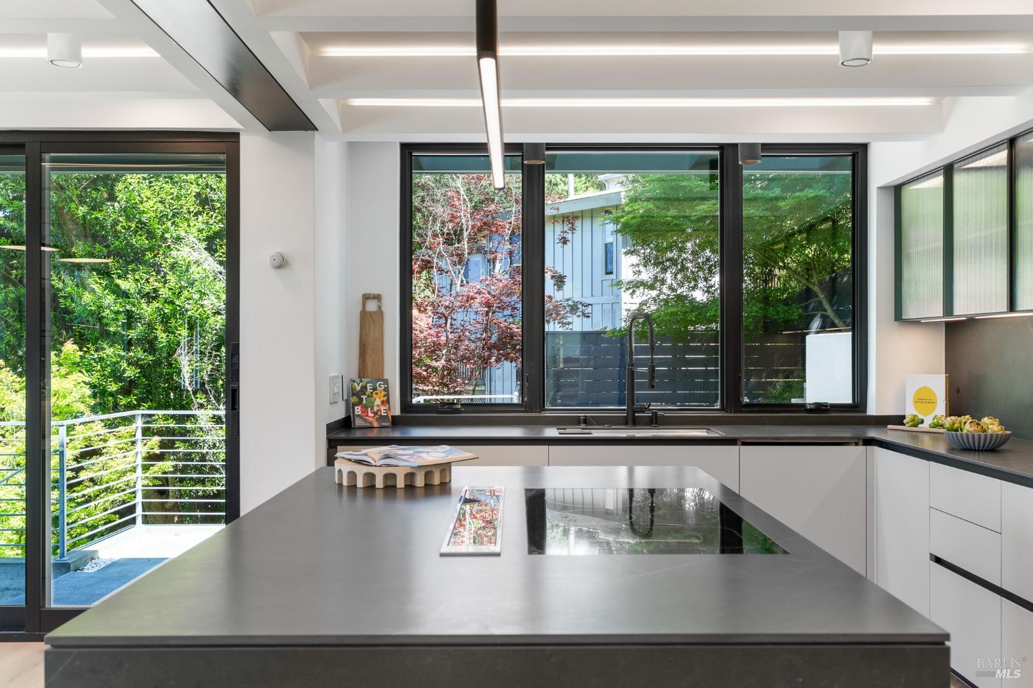975 Greenhill Road Mill Valley, CA 94941 - Photo 26 of 53 a kitchen with a large window and a sink