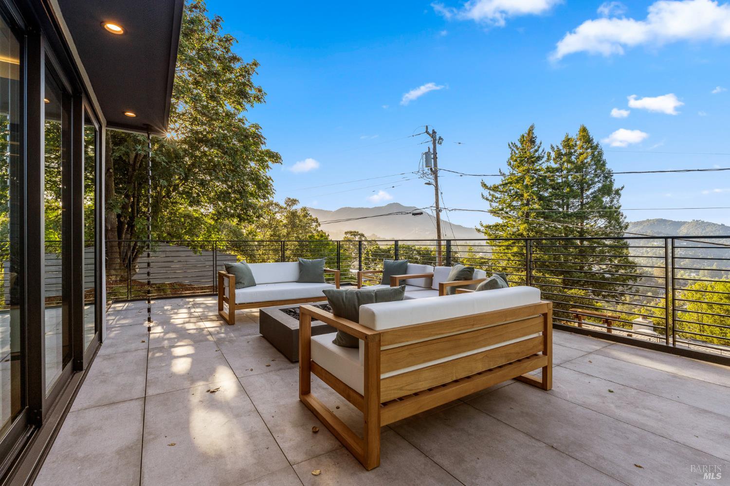 975 Greenhill Road Mill Valley, CA 94941 - Photo 45 of 53 a outdoor sitting area with couch and a table