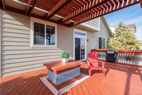 a outdoor space with patio the couches and a dining table with chairs