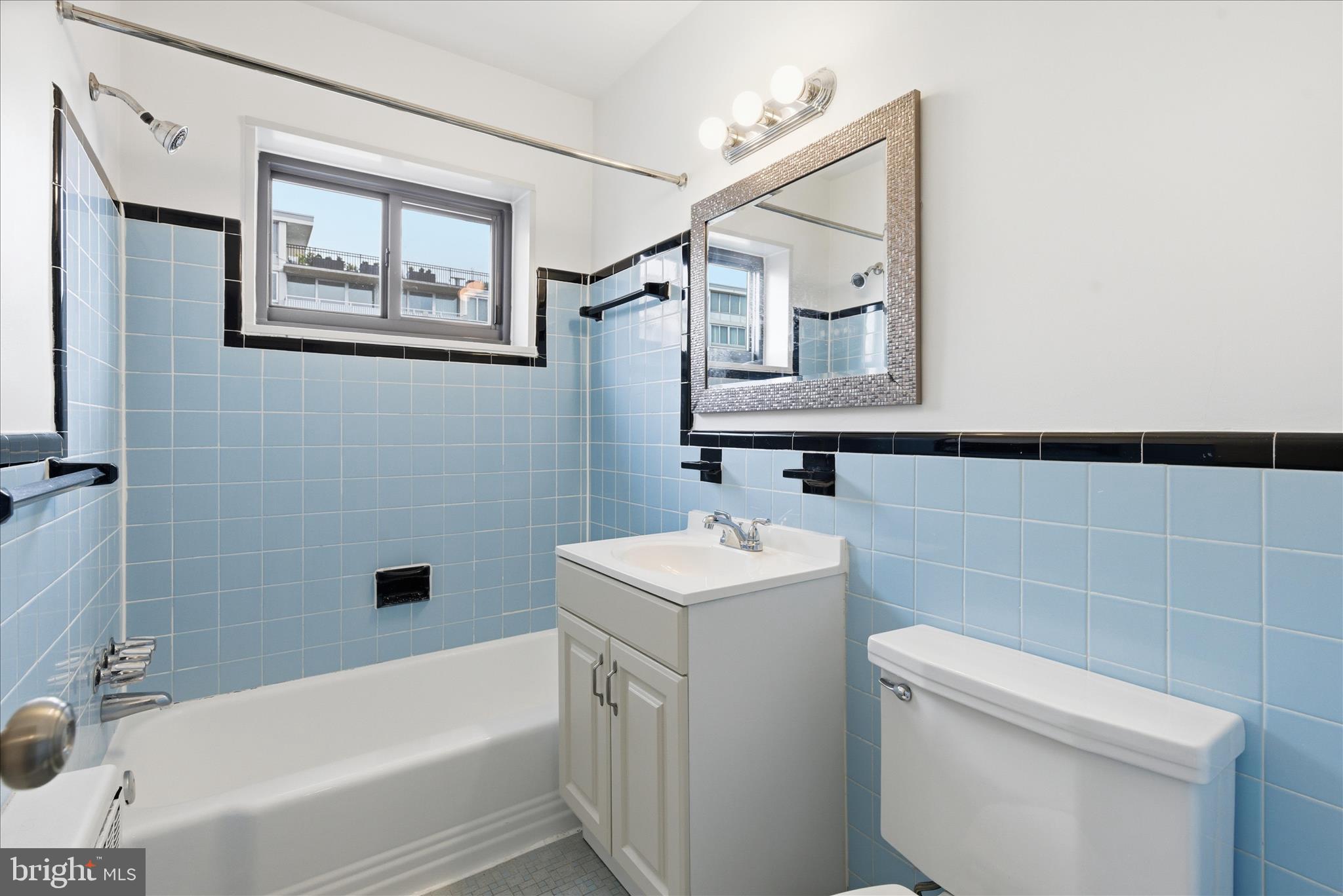 1200 South Arlington Ridge Road, Unit 717 Arlington, VA 22202 - Photo 13 of 24 a bathroom with a toilet sink and bathtub