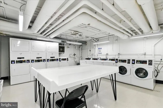 a view of livingroom with furniture and washer
