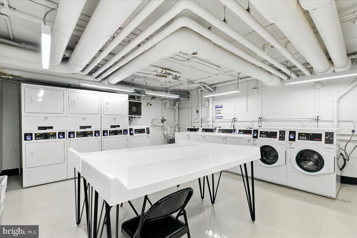 1200 South Arlington Ridge Road, Unit 717 Arlington, VA 22202 - Photo 15 of 24 a view of livingroom with furniture and washer