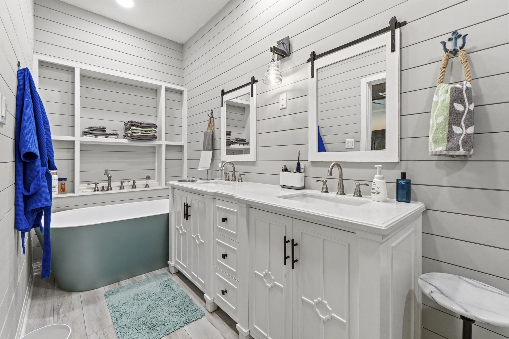 2 Key Harbour Conroe, TX 77356 - Photo 30 of 41 a bathroom with a sink vanity and a mirror
