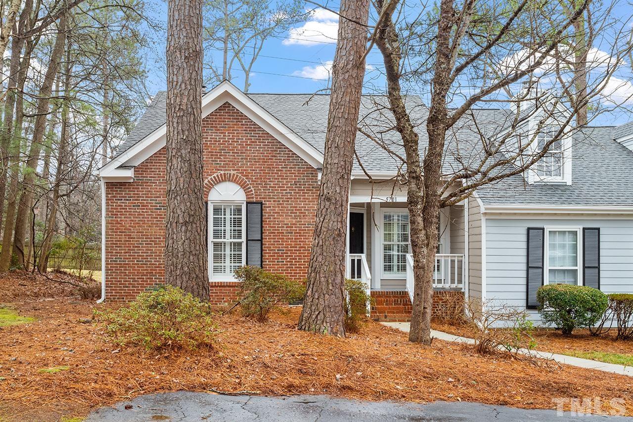 5701 Grasmere Court Raleigh, NC 27609 - Photo 2 of 34 a view of a house with a yard