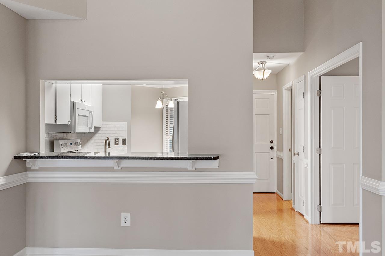 5701 Grasmere Court Raleigh, NC 27609 - Photo 29 of 34 a bathroom with a sink and a mirror
