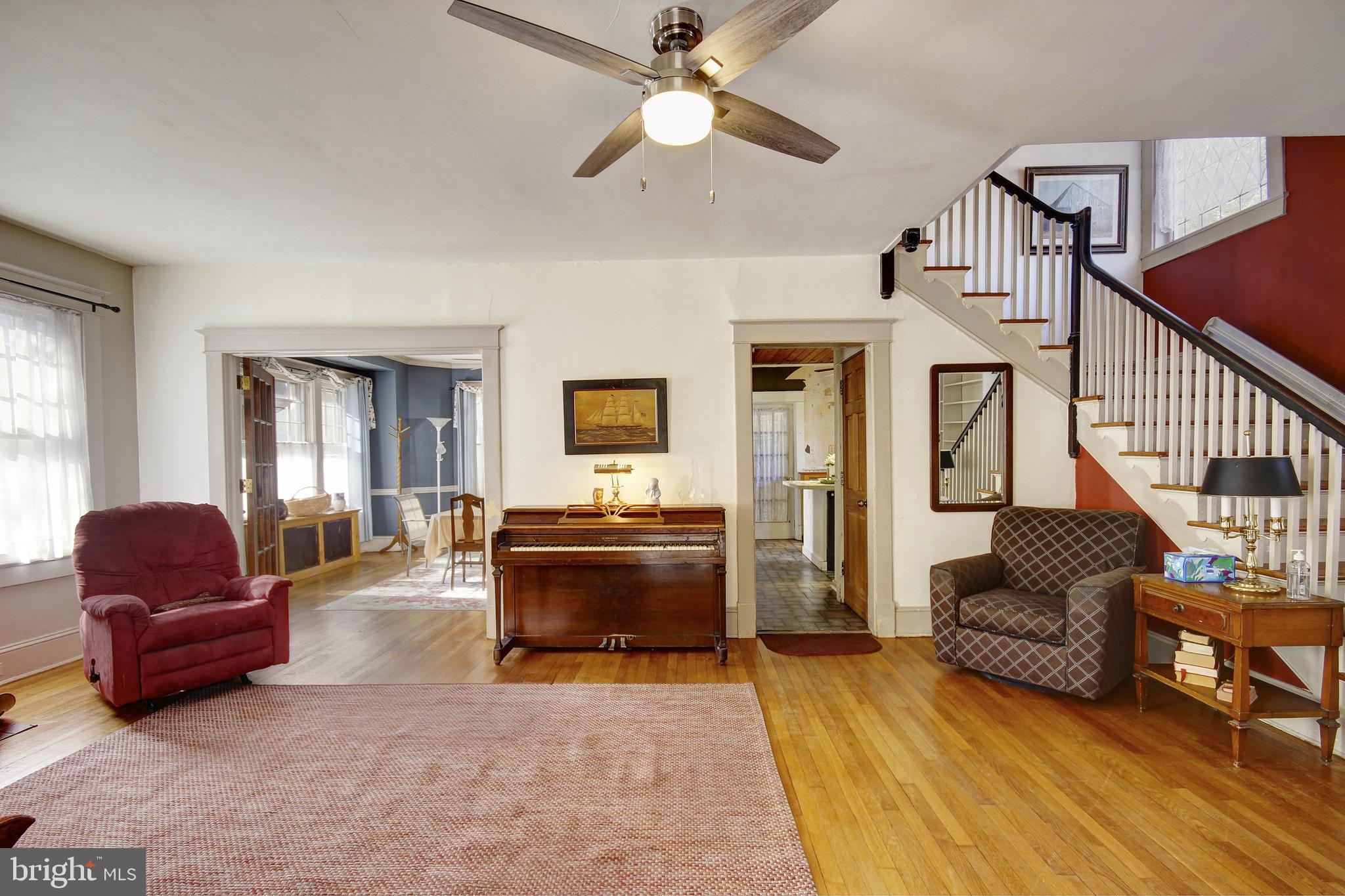 616 Camden Avenue Salisbury, MD 21801 - Photo 4 of 24 a living room with furniture and a fireplace