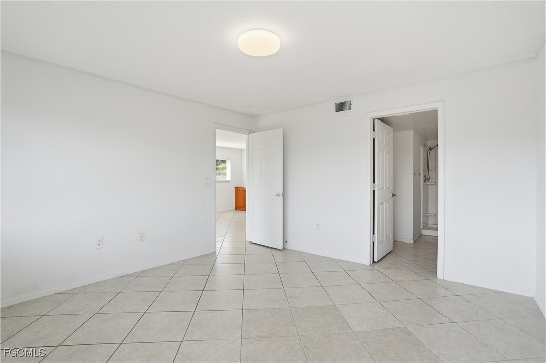 240 Pebble Beach Boulevard, Unit 712 Naples, FL 34113 - Photo 15 of 22 a view of an empty room