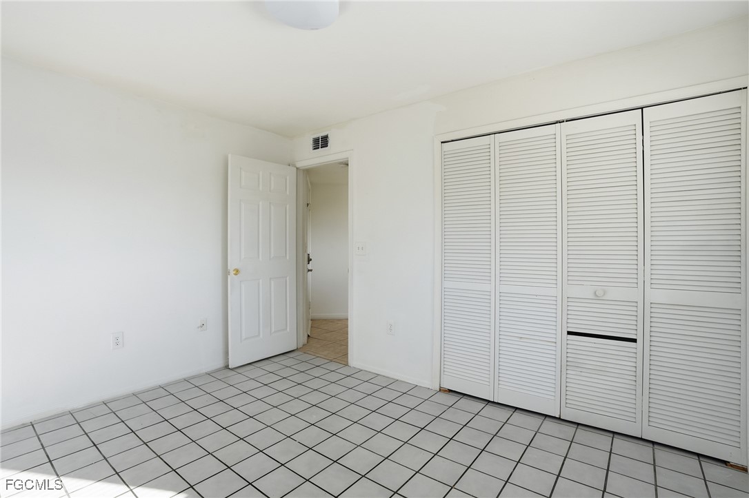 240 Pebble Beach Boulevard, Unit 712 Naples, FL 34113 - Photo 18 of 22 a view of an empty room