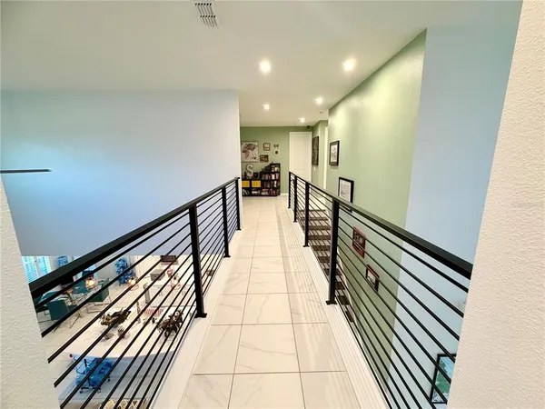 a room with a sink furniture and a mirror