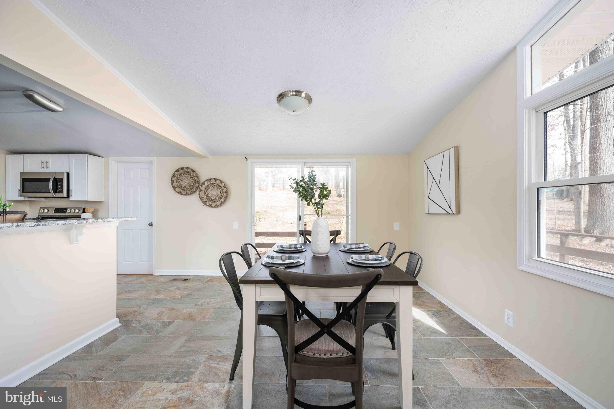 116 Lakeview Parkway Locust Grove, VA 22508 - Photo 14 of 71 a view of a dining room with furniture and a window