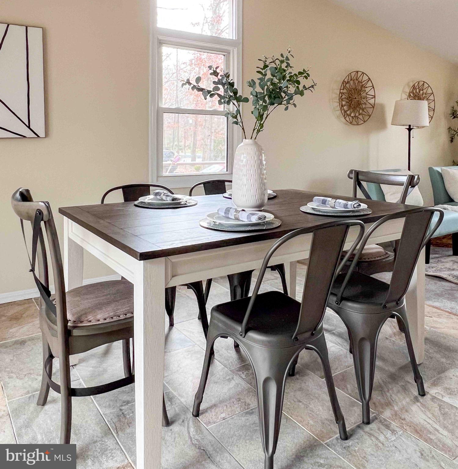 116 Lakeview Parkway Locust Grove, VA 22508 - Photo 18 of 71 a view of a dining room that has a table and chairs in it