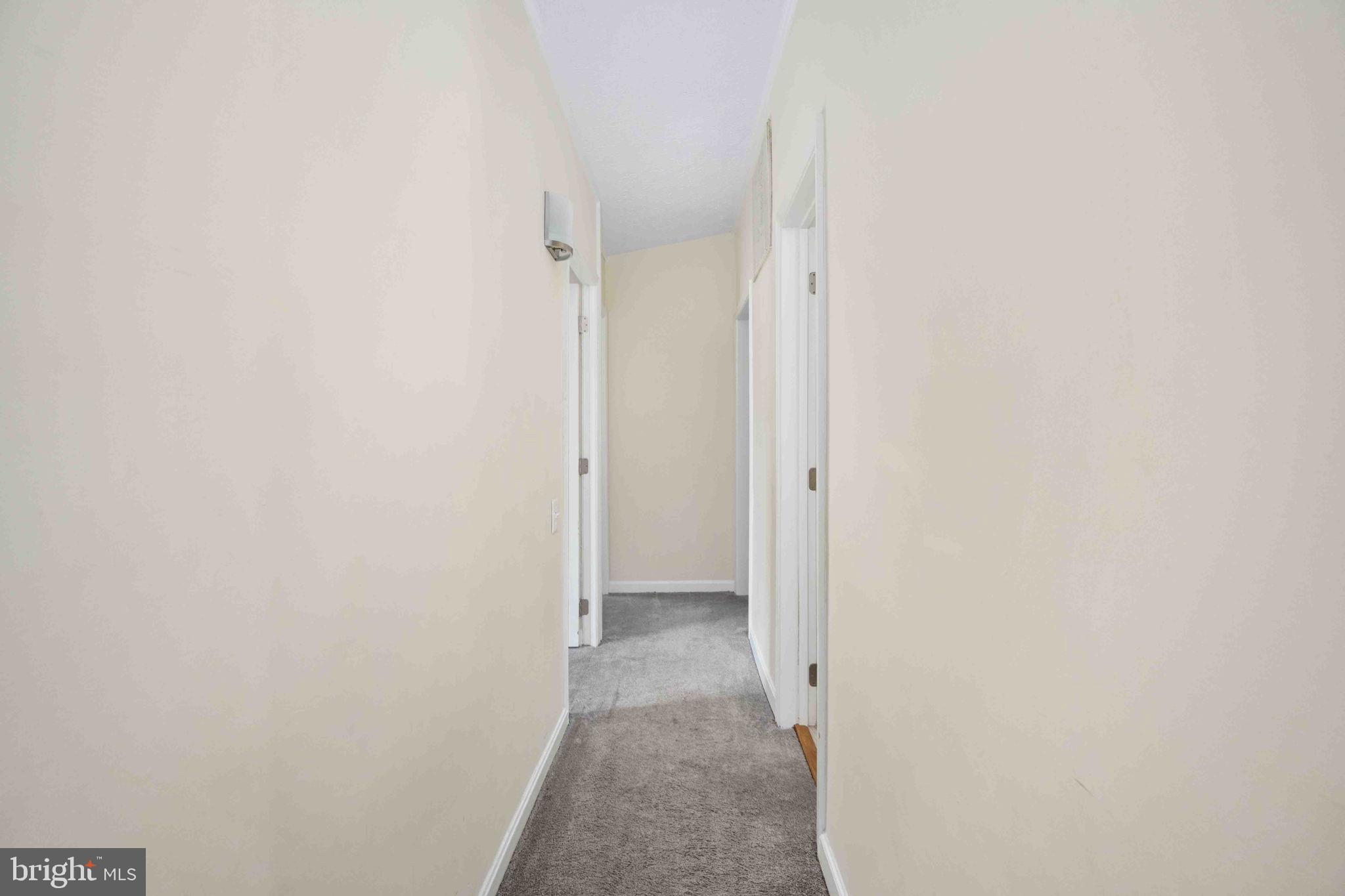 116 Lakeview Parkway Locust Grove, VA 22508 - Photo 30 of 71 a view of a hallway with a white walls