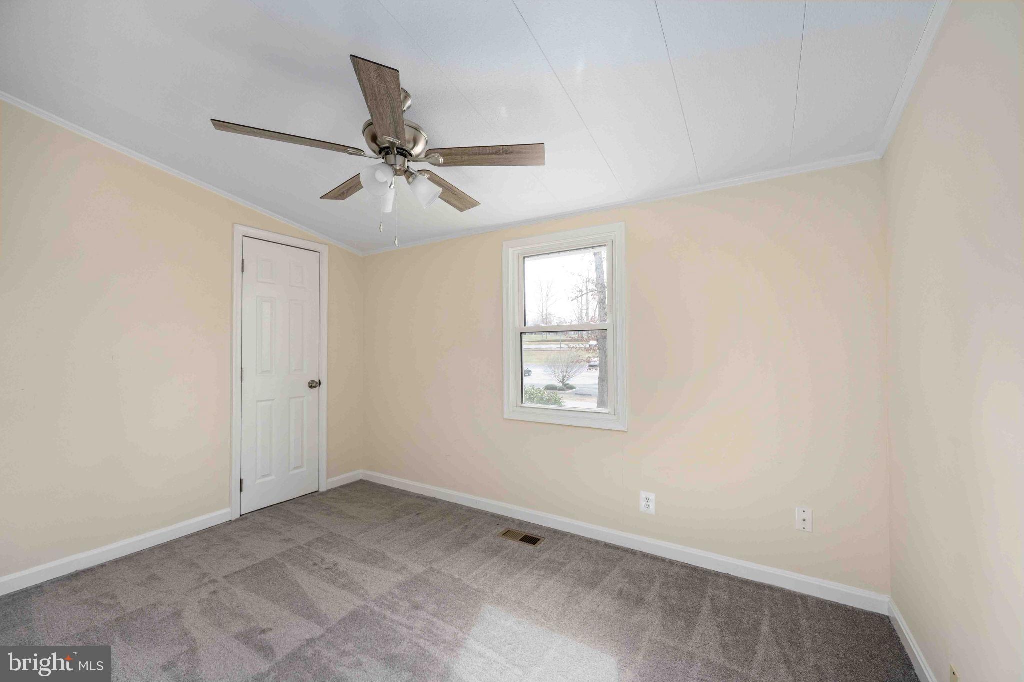 116 Lakeview Parkway Locust Grove, VA 22508 - Photo 42 of 71 a view of an empty room with a window