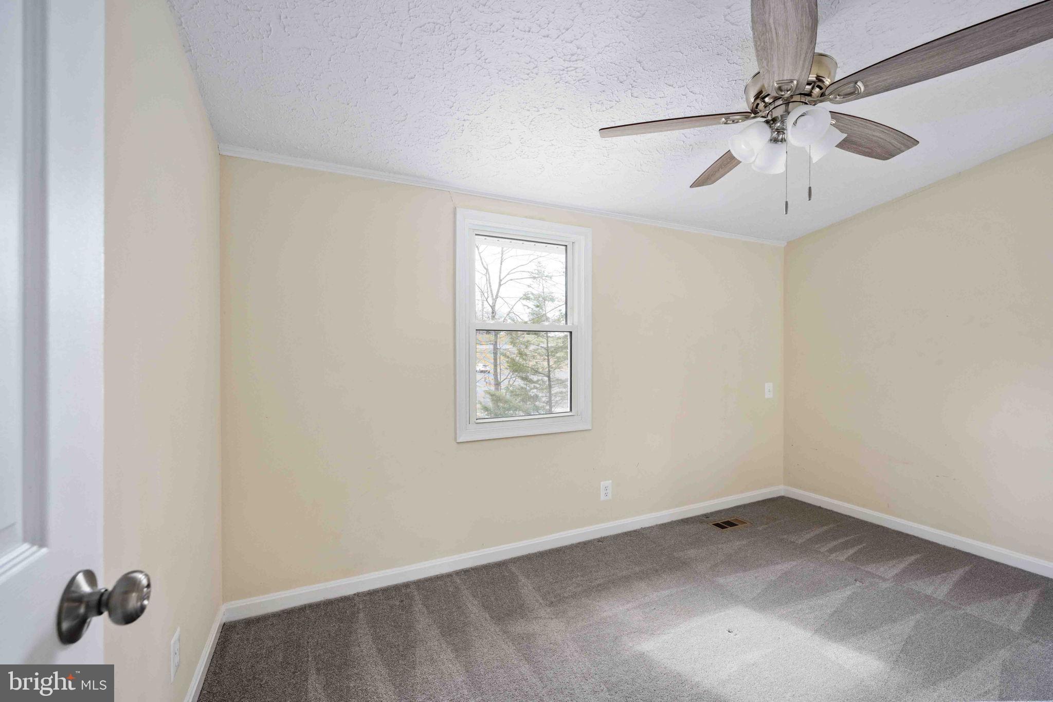 116 Lakeview Parkway Locust Grove, VA 22508 - Photo 44 of 71 wooden floor in an empty room with a window