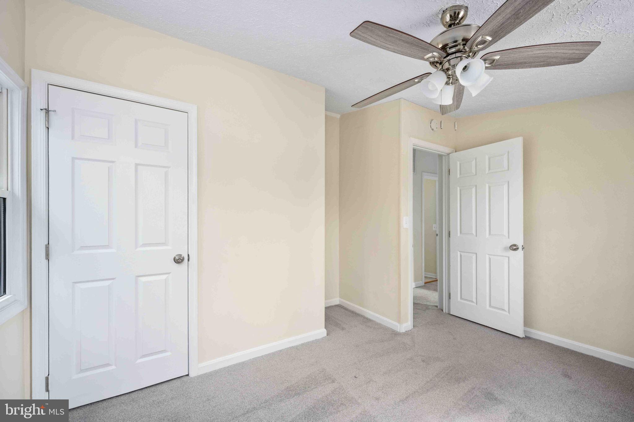 116 Lakeview Parkway Locust Grove, VA 22508 - Photo 46 of 71 a view of a livingroom with a chandelier fan