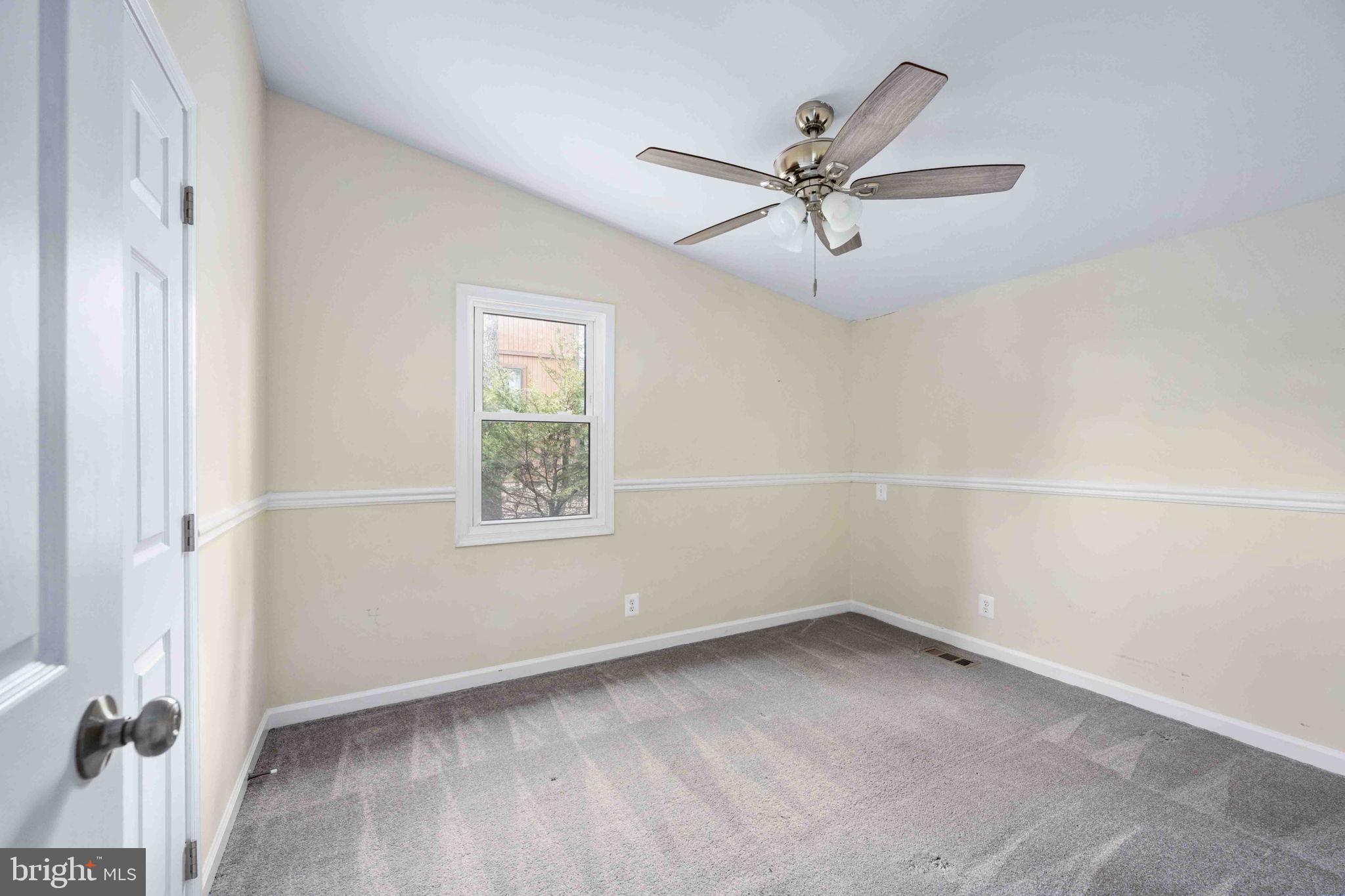 116 Lakeview Parkway Locust Grove, VA 22508 - Photo 48 of 71 an empty room with a window and a fan