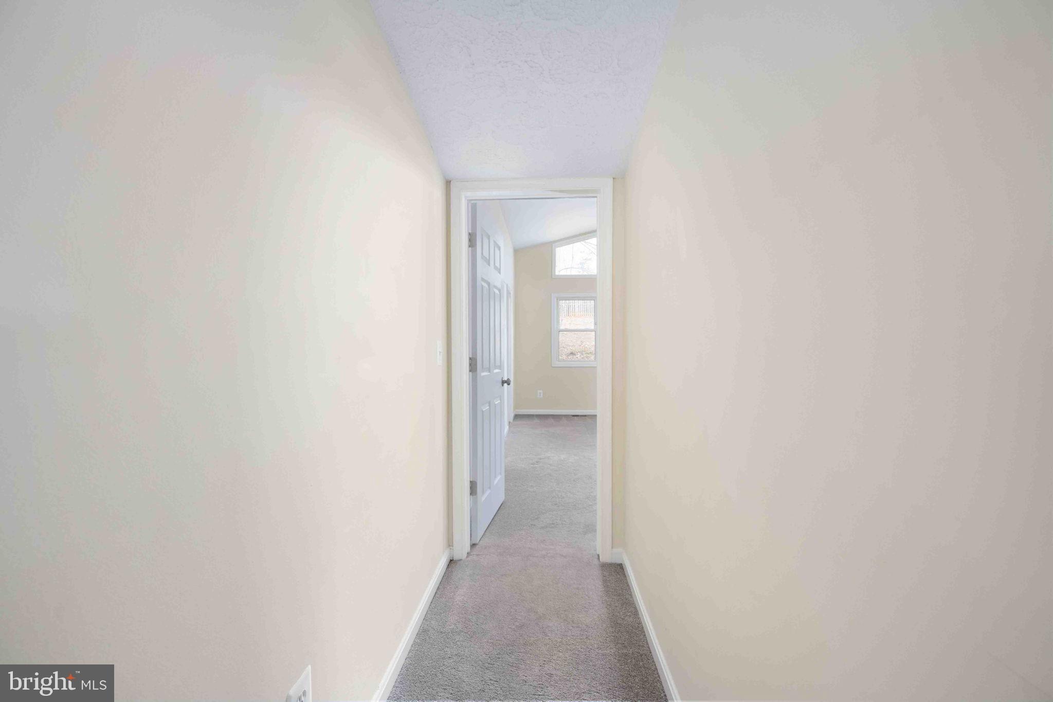 116 Lakeview Parkway Locust Grove, VA 22508 - Photo 50 of 71 a view of a hallway with a white walls