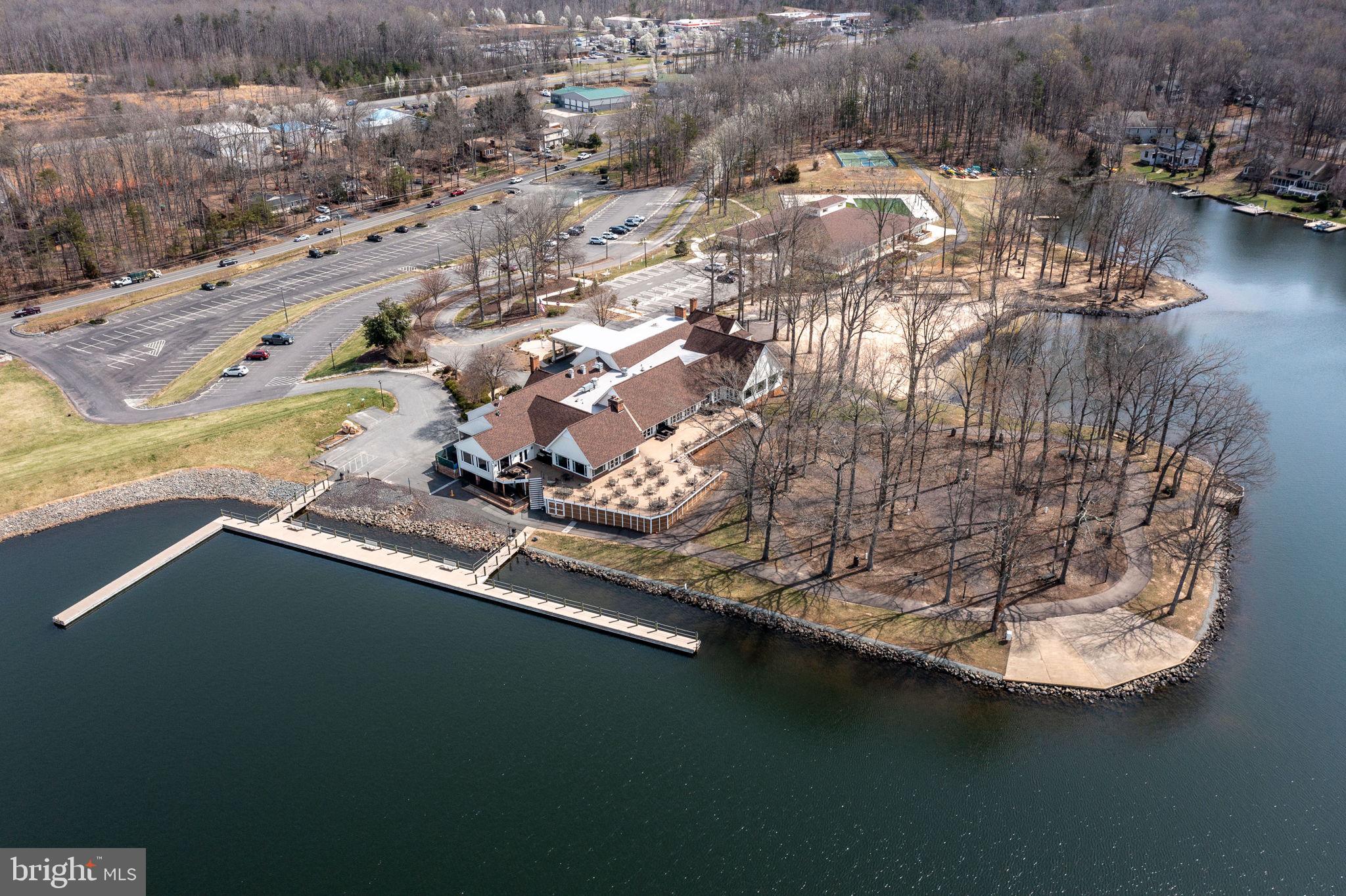 116 Lakeview Parkway Locust Grove, VA 22508 - Photo 70 of 71 an aerial view of residential houses with outdoor space and lake view