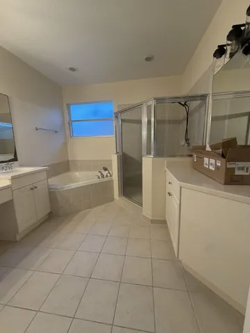 a bathroom with a sink a toilet and tub