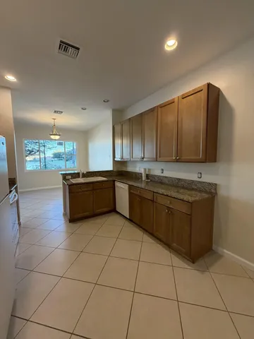a kitchen with a cabinets and counter space