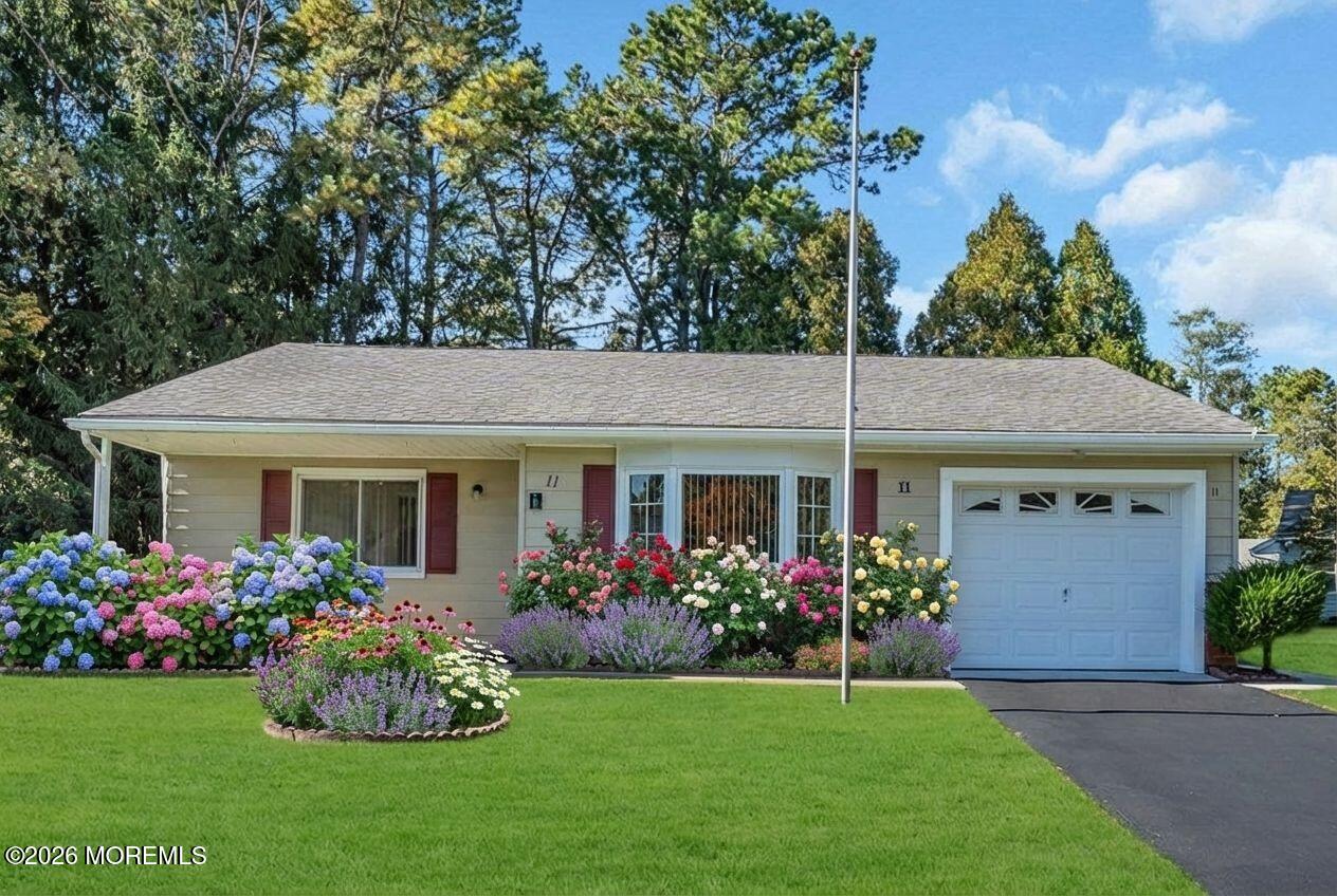 a front view of house with yard