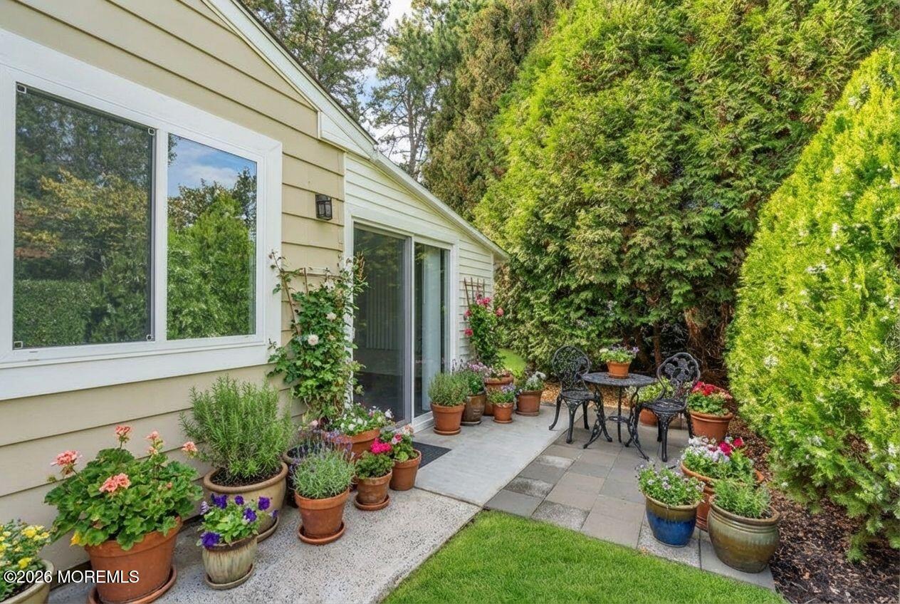 11 Vermont Way Whiting, NJ 08759 - Photo 14 of 14 a view of a backyard with sitting area and garden