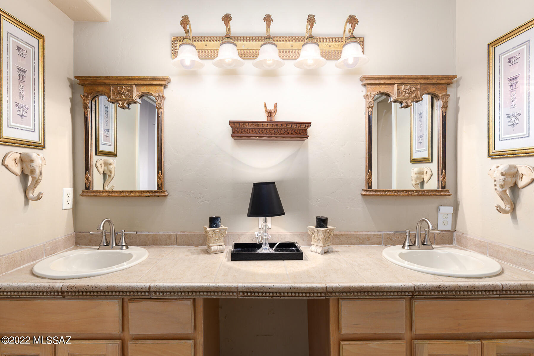 317 Valley View Drive Rio Rico, AZ 85648 - Photo 39 of 49 a bathroom with a sink and a mirror