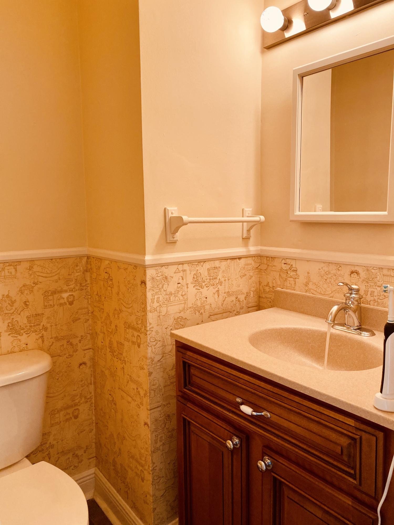 1907 Penman Road Jacksonville Beach, FL 32250 - Photo 19 of 25 a bathroom with a sink and a toilet