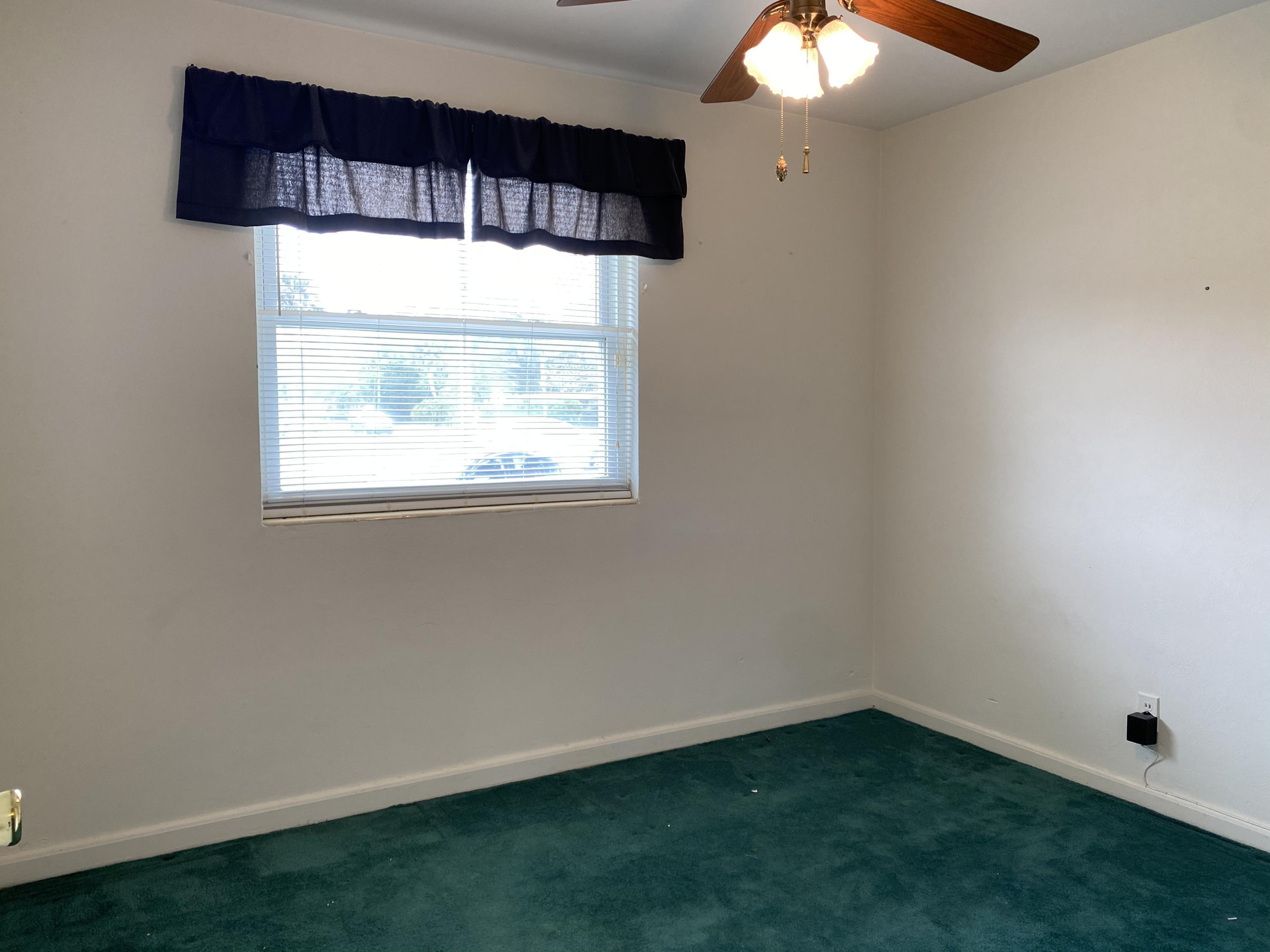 1907 Penman Road Jacksonville Beach, FL 32250 - Photo 22 of 25 a view of an empty room with a window