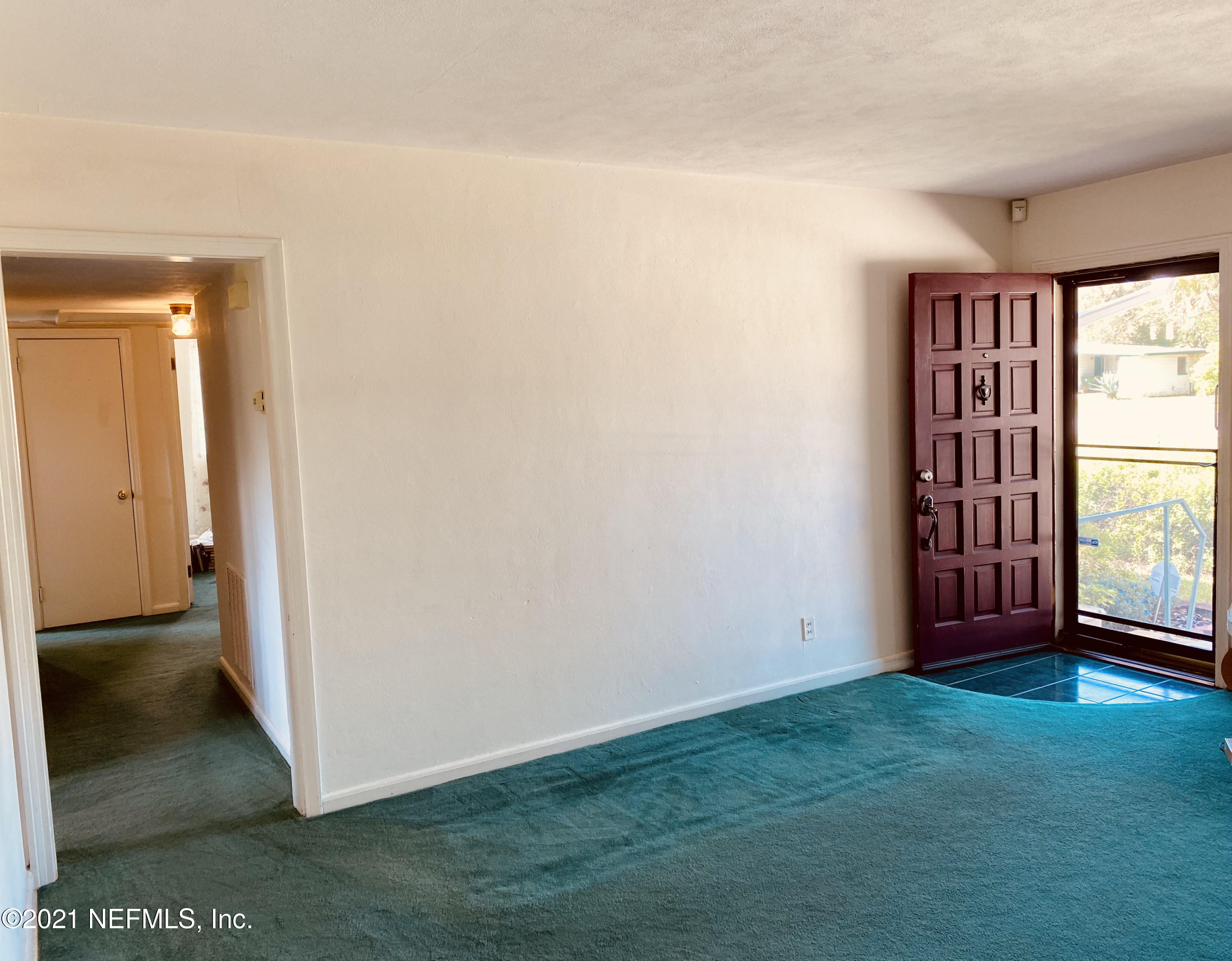 1907 Penman Road Jacksonville Beach, FL 32250 - Photo 8 of 25 an empty room with windows and closet