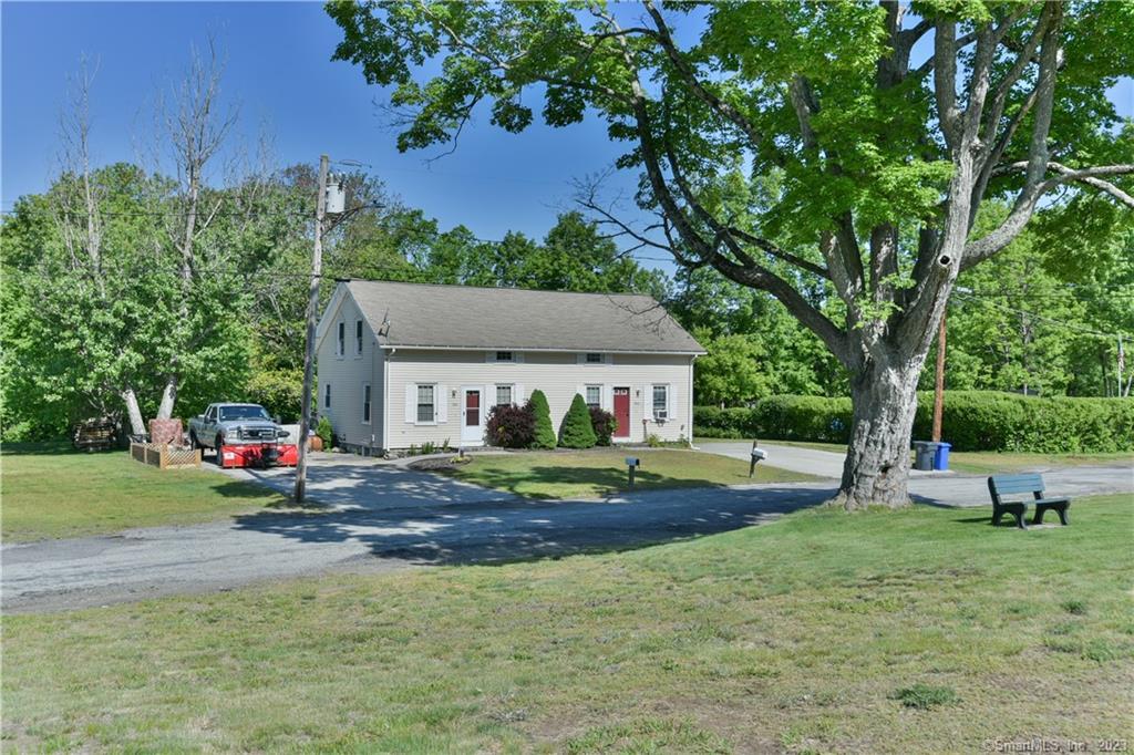 24 Old Rte 12 Thompson, CT 06277 - Photo 1 of 1 a view of a house with a back yard