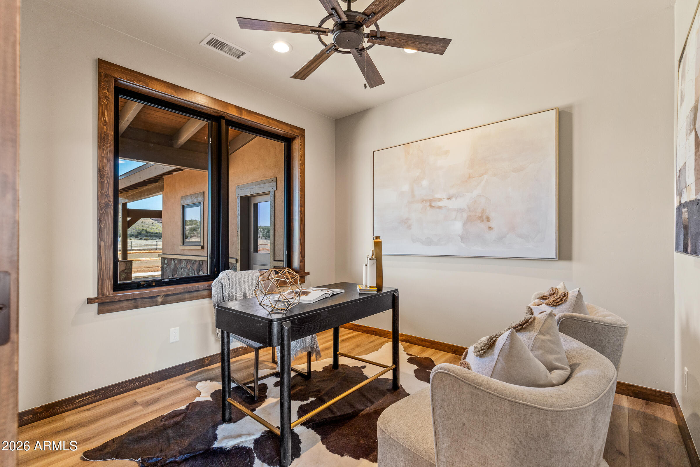 6570 Meadows Lane Flagstaff, AZ 86004 - Photo 11 of 66 a living room with furniture and window