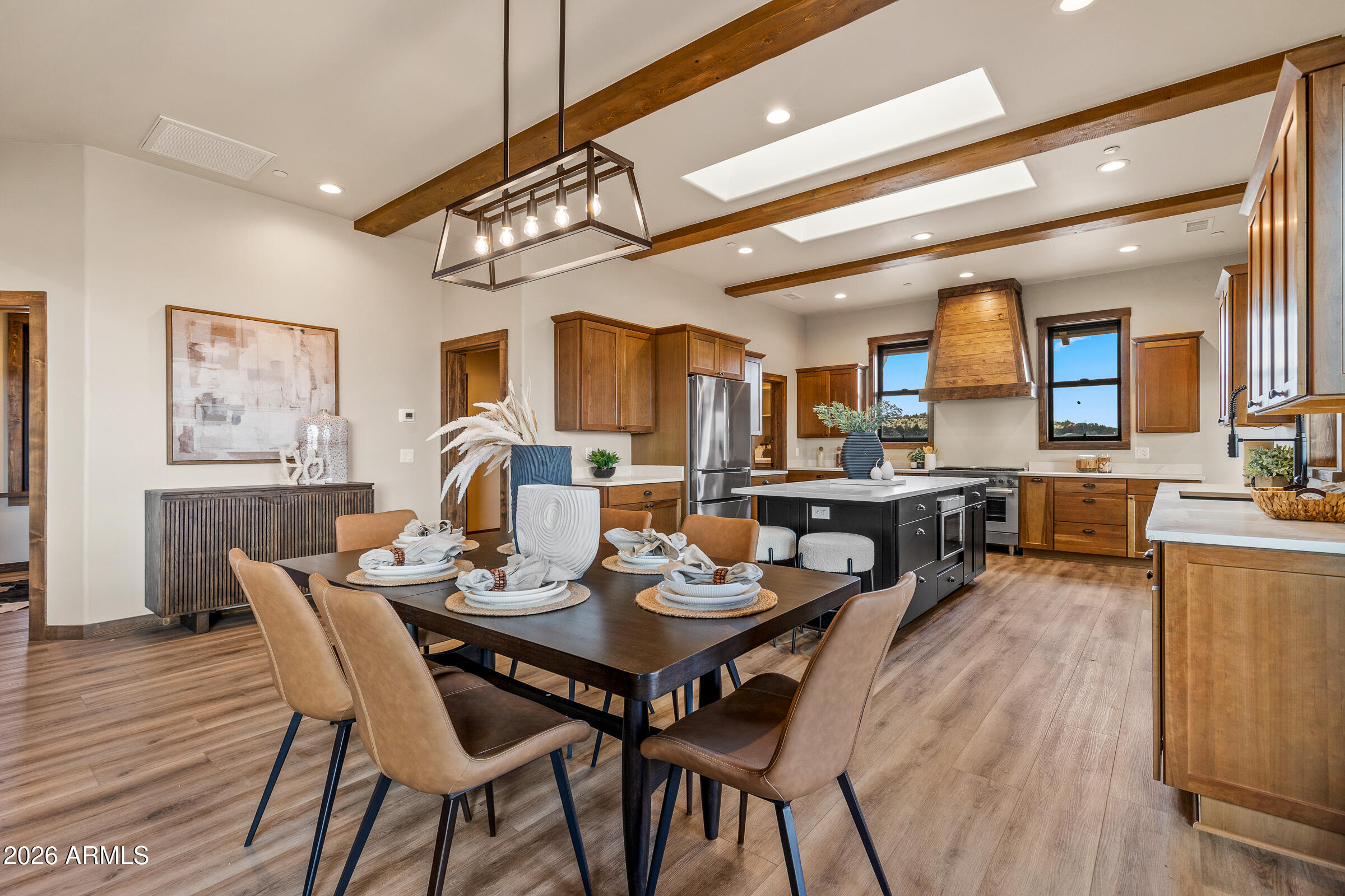 6570 Meadows Lane Flagstaff, AZ 86004 - Photo 14 of 66 a view of a dining room with furniture and wooden floor