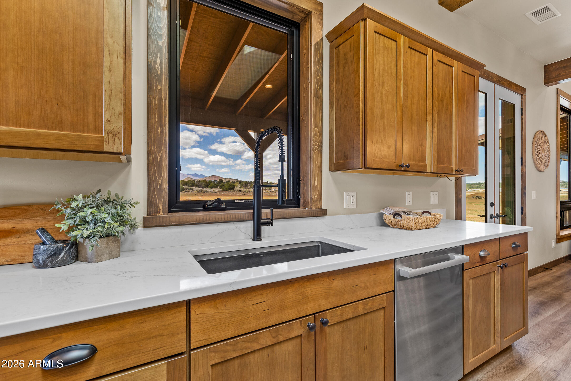 6570 Meadows Lane Flagstaff, AZ 86004 - Photo 18 of 66 a kitchen with a sink and a window