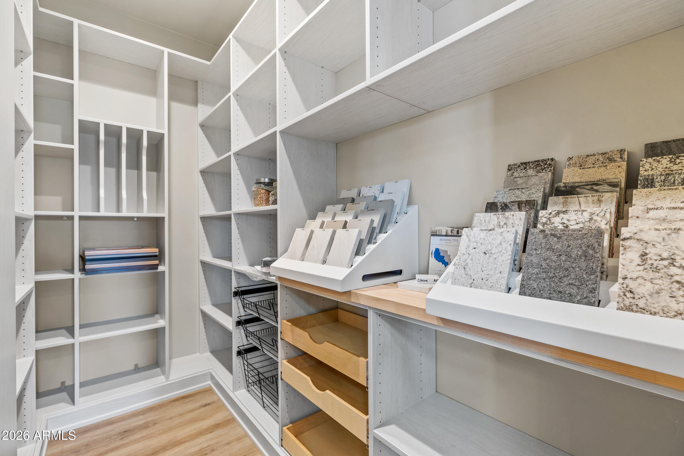 6570 Meadows Lane Flagstaff, AZ 86004 - Photo 22 of 66 a view of walk in closet with clothes and shoes