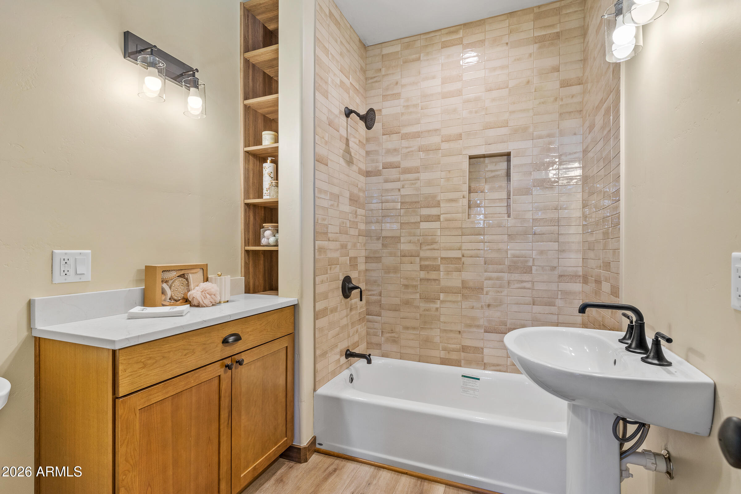 6570 Meadows Lane Flagstaff, AZ 86004 - Photo 30 of 66 a bathroom with a sink and a mirror