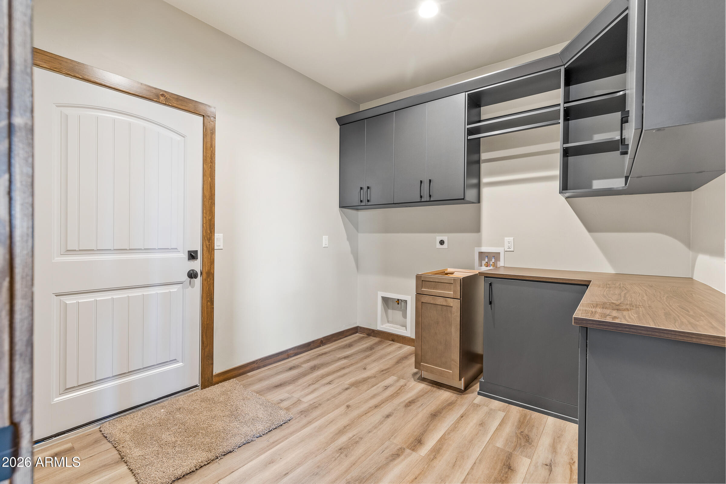 6570 Meadows Lane Flagstaff, AZ 86004 - Photo 36 of 66 a view of a kitchen with wooden floor and electronic appliances